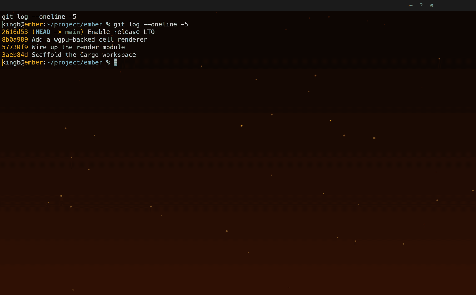 Ember with the campfire backdrop and drifting embers